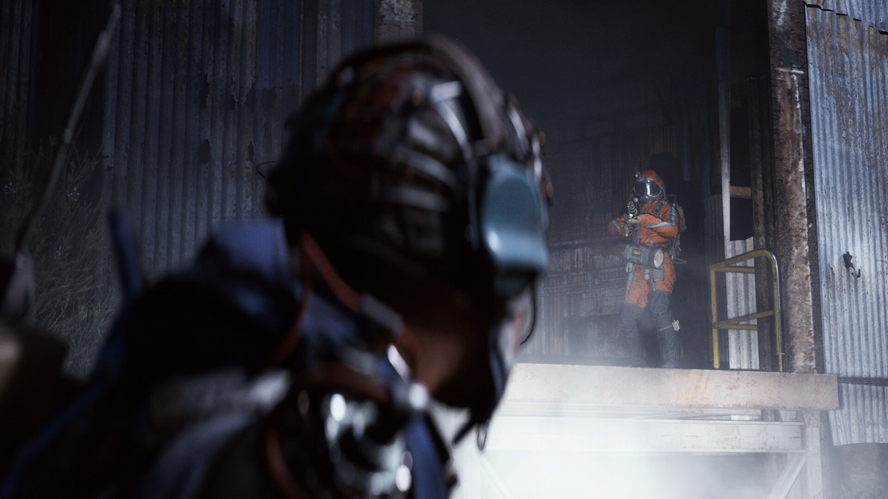 Two raiders in a tense standoff inside a derelict corrugated-metal structure in Arc Raiders