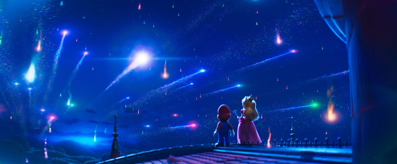 A dynamic action shot from The Super Mario Galaxy Movie with Mario in a cosmic setting